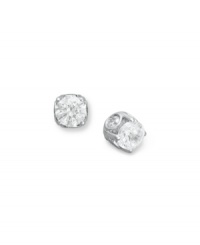 Diamonds with a little extra dazzle. These sweetly-sparkling stud earrings not only feature a round-cut diamond at center, but each pair has a bezel-set diamond in the side as well (total 1 ct. t.w.). Set in 14k white gold with a post backing. Approximate diameter: 4-9/10 mm.