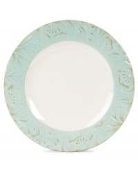 Sculpted blooms and a classic silhouette make the Toulouse dinner plates by Fitz and Floyd a charming part of any casual landscape. A rustic green glaze adds to its antique appeal.