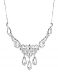 Stylish illumination. Eliot Danori's dazzling and dramatic frontal necklace highlights shimmering crystals in an intricate silver tone mixed metal setting. Approximate length: 16 inches + 2-inch extender. Approximate drop length: 4 inches. Approximate width: 5 inches.