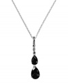 Double up on the drama. Judith Jack's bold style features two, graduated teardrops crafted from smokey topaz (3-3/8 ct. t.w.) and glittering marcasite at the bail (1/5 ct. t.w.). Set in sterling silver. Approximate length: 16 inches. Approximate drop: 1-5/8 inches.