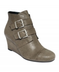 A pretty duo of buckled straps adds intrigue to the the vamp of the Rynissa wedge booties by RACHEL Rachel Roy.