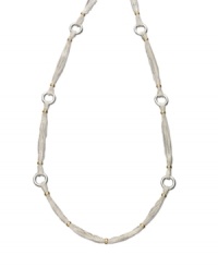 A simple classic, this necklace features a clean design from the Lauren by Ralph Lauren collection. Crafted in silvertone and goldtone mixed metal. Approximate length: 36 inches.