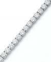 Match point. Arabella's stunning tennis bracelet combines dozens of round-cut Swarovski zirconias (31 ct. t.w.) in polished sterling silver. Approximate length: 7-1/2 inches.