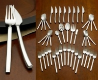 The Opus Flatware set marries sleek design with Henckels world-class quality. This heavy gauge, 18/10 stainless steel service for eight features polished handles and a larger continental size. Set includes 5-piece place settings for eight, (Includes: Knife, fork, spoon, salad fork and teaspoon) plus a 5-piece hostess set.