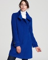 Top your winter looks with vibrant color with this richly hued Trina Turk coat in a luxe wool blend.