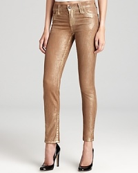 With a coated metallic finish, True Religion's Halle skinny jeans bring in the season with festive style.