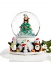 In this most adorable holiday keepsake from Holiday Lane, four festive penguins celebrate the season as the traditional tune of Jingle Bells plays and shimmering snow falls all around them.