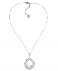 Elevate your evening attire with this sparkling addition. Carolee's stunning pear-shaped pendant is decorated with glittering crystals set in silver tone mixed metal. Approximate length: 16 inches +2-inch extender. Approximate drop: 1-5/8 inches.