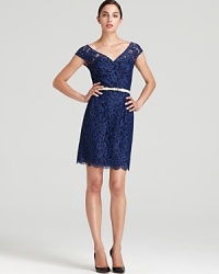 Delicate lace lends romantic inspiration to a classic Lilly Pulitzer dress, finished with cap sleeves and a scalloped hem for pure feminine charm.