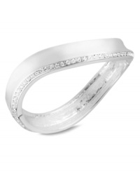 Make waves with this hinged bangle bracelet from Robert Lee Morris. Crafted from silver-tone mixed metal, the piece gets a lustrous addition by way of glass pave crystal accents. Approximate diameter: 2-3/8 inches.