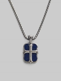 An original design pairs two sterling silver pendants on a single strand. The cross pendant is crafted with pavé diamond detail, and the larger features smooth lapis inlay. Sterling silver Pavé diamonds Lapis Pendant: 1 long Necklace: 24 long Lobster clasp closure Imported 