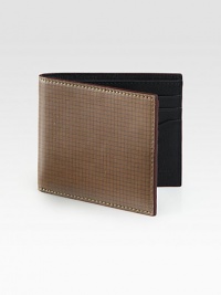 Inspired by the standard geometric graph paper, this leather credit card holder finds the balance between practicality and style.One billfold compartmentSix card slotsLeather4W x 4HImported