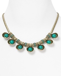 An instant wow piece. This Giles & Brother necklace flaunts edgy allure with sinuous chains, accented by seashell dangles.