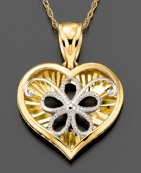 This classic heart pendant is lovingly embellished with a sweet five-petal flower. Crafted in white and yellow 14k gold. Approximate length: 18 inches. Approximate drop: 3/4 inch.