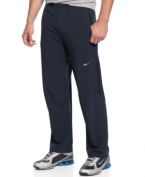 Keep your cool even when you're working out with these Nike running pants featuring zippered legs and Dri-Fit technology.