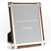 Made entirely from hand, each piece of William Yeoward Crystal draws its inspiration from antique crystal pieces originally made in England during the 18th and early 19th centuries. Traditionally styled and utterly elegant, the Classic Shagreen frame is an elegant way to frame your favorite photos.