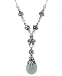 Earthy elegance. Genevieve & Grace's Y-shaped necklace is crafted from sterling silver, with a flower motif, as well as marcasite and jade (16-1/2 ct. t.w.) adding to the appeal. Approximate length: 16 inches. Approximate drop: 1 inch. Approximate width: 1/2 inch.