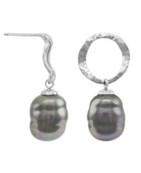 High style with rustic charm. These simple earrings by Majorica feature iridescent, organic, man-made baroque pearls (12 mm) suspended from hammered metal circles. Drops crafted from sterling silver. Approximate drop: 1 inch.