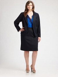 Inspired by the classic menswear staple, this jacket is decidedly feminine with a sleek silhouette and well-placed seams to perfectly complement your shape.Notched collarLong sleevesButton closureWelt pockets Back ventsFully linedAbout 26 from shoulder to hem75% polyester/20% viscose/5% rayonDry cleanImported