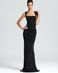 In a figure-flaunting silhouette, Nicole Miller's square neck dress shows off a curve-skimming fabric and an open back.