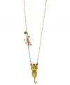 Betsey Johnson ups your fierce factor with this pendant necklace. Crafted from antique gold-tone mixed metal, it features a tiger pendant with crystal accents, red bow and ears, and bronze tone details. It's paired with a salamander friend with crystal accents, gold tone details and green leaves. Approximate length: 31 inches + 3-inch extender. Approximate drop: 2-3/4 inches.