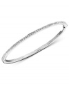 A ring of clear crystals gives your wrist an extra hint of elegance. This stackable bracelet by Eliot Danori features a silver tone mixed metal setting with round-cut crystal accents. Approximate diameter: 2-1/2 inches.