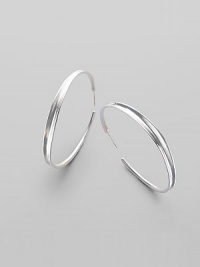 EXCLUSIVELY AT SAKS. Sophisticated hoops in polished sterling silver are subtly tapered from the middle. Sterling silver Diameter, about 2 Post back Imported