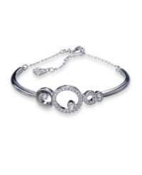 Gorgeously geometric. Featuring a circular motif, Swarovski's Maskerade bangle bracelet is embellished with sparkling bezel-set and clear pavé crystals. Crafted in silver tone mixed metal. Approximate diameter: 2-1/4 inches + 1-1/2 inch extender.