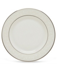 Pure opulence. Posh opalescence. This classically designed line of Lenox dinnerware and dishes is accented by a platinum rim and a delicate flourish of vine-like, white-on-white imprints with raised, iridescent enamel dots. Great gift for a housewarming, wedding or yourself. Bread and butter plate shown top right.