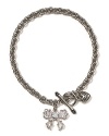 Juicy Couture's shiny chain bracelet with a dangling pendant makes every wrist seem a bit more delicate and dainty.