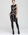 Bombshell alert: a body-con dress by BCBGMAXAZRIA is simply explosive with ravishing lace accents and an exposed back zip.