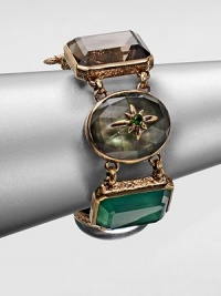 An one of a kind design inspired by the designer's love of nature's bounty that features a wealth of beautiful semi-precious stones set in intricately designed bronze. Blue agate quartz, opal mosaic, green agate quartz, grey mother-of-pearl in rock crystal and smoky quartzBronzeLength, about 7.5Toggle closureMade in USA