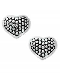 Love defined. Giani Bernini's pretty & petite heart studs feature a textured surface. Set in sterling silver. Approximate diameter: 1/2 inch.