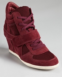 A sporty style from Ash-featuring alternating suede and canvas with athletic details.