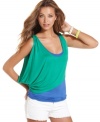 Cool kid on the color block: from the two-tone layers to the gaping drape design, this top from Pout redefines the standard summer tank!