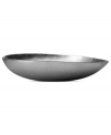 Elegance with an edge. Cast and finished by hand, the radiant Burnished Metal oval bowl boasts a sleek, modern look with the rich textural detail that defines the Donna Karan by Lenox collection.