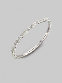 EXCLUSIVELY AT SAKS. A delicate design, offering two rows of small crystal solitaires with larger ones stationed along the slender bangle. Crystal Rhodium plated Diameter, about 2½ Hinged with push-lock clasp Imported Please note: Bracelets sold separately.