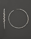 Faceted diamonds add gorgeous sparkle to slim sterling silver hoops. From the Silver Rain collection by Ippolita.