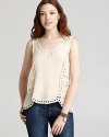 Cut from rich silk, this Joie top features an intricate eyelet pattern adorned with sparkling beads.