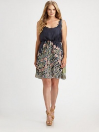 Leave it to a perennially feminine floral print to create an unquestionably romantic design. This silk dress also features a romantic neckline and a figure-flattering drawstring waist. ScoopneckSleevelessDrawstring waistPull-on styleHandkerchief hemAbout 43 from shoulder to hemSilkHand washImported