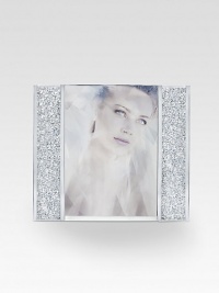 Show off your special moments in fabulous crystal design with thousands of shimmering chatons and silvertone details. Accommodates a 3½ X 5 photograph Overall 5 X 6 Made in Austria