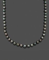 Channel the look of a Tahitian goddess. Belle de Mer's smooth strand of black cultured Tahitian pearls (8-9 mm) completes a look of rich opulence. Set in 14k gold. Approximate length: 18 inches.