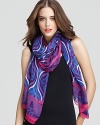 Add a bohemian touch to your favorite ensemble with a oval eye printed scarf from Theodora & Callum.