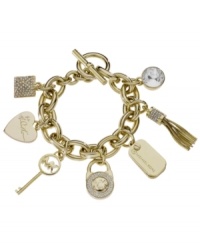 Bring on the charm. Make the perfect first impression with this designer style from Michael Kors. Crafted in gold tone mixed metal, bracelet features a variety of signature charms and Czech crystals with a trendy toggle clasp. Approximate length: 8 inches. Approximate charm drops: 1/2 inch to 1 inch.