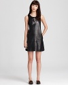 A feminine silhouette takes on downtown edge when rendered in soft lambskin leather with featuring cutout detail at the back. The Rebecca Minkoff dress is the must-have of the season--mod with ankle booties and smart with summer's de rigeueur smoking flat.