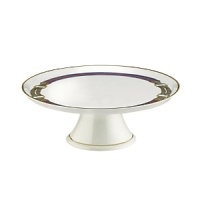 A whimsical bridle decal accents this porcelain Ralph Lauren cake plate, finished with a luxe gold stripe at the base and rim.