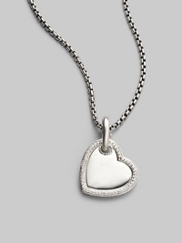 From the Heart Collection. A pretty enhancer, edged with stunning pavé diamonds is a true gift from the heart. Diamonds, 0.38 tcw Sterling silver Pendant width, about 1 Imported Please note: Chain sold separately.