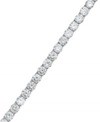 Classically chic. Every girl should have this Eliot Danori bracelet in her collection. A traditional tennis bracelet design is decorated by a seamless row of round-cut cubic zirconias (13-1/3 ct. t.w.). Set in silver tone mixed metal. Approximate length: 7-1/4 inches.