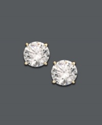 Invest in timeless style and traditional design. Stunning round-cut diamonds (1/3 ct. t.w.) are cradled in a 14k gold four-prong setting. Approximate diameter: 3-1/2 mm.