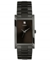 Take a walk on the dark side with this black-on-black timepiece from GUESS.